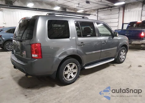 2010 Honda Pilot Touring z USA, uszkodzony, nr VIN 5FNYF4H99AB024599